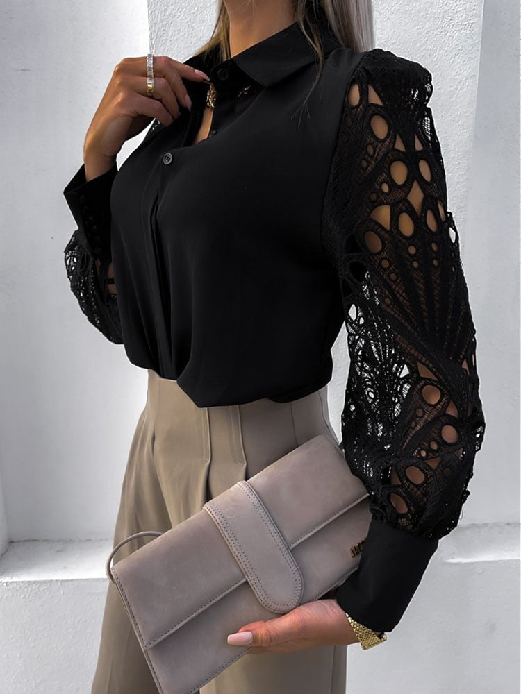 BLUSA CON APERTURAS