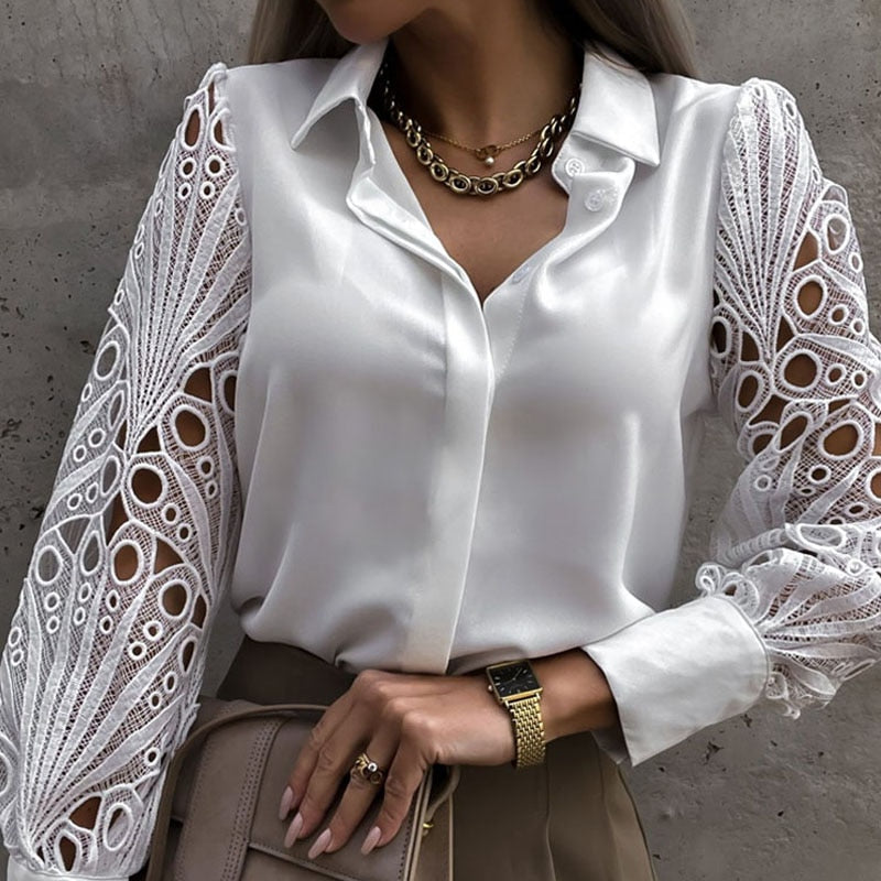 BLUSA CON APERTURAS