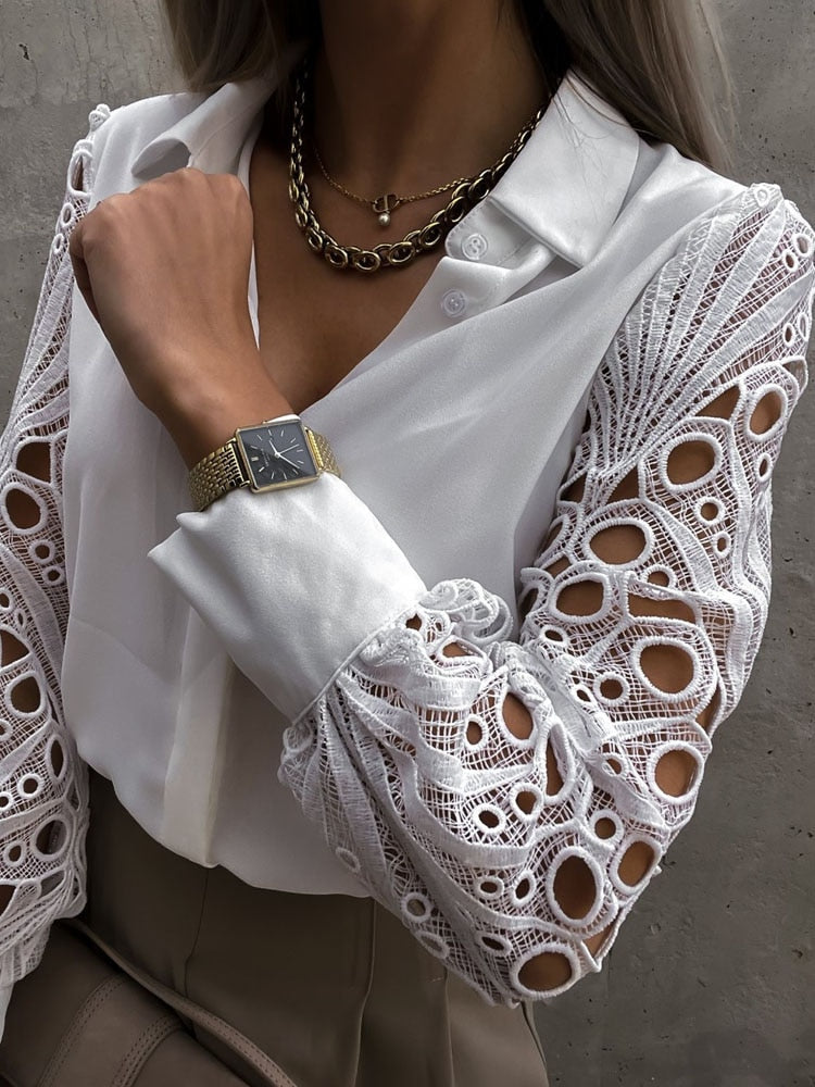 BLUSA CON APERTURAS